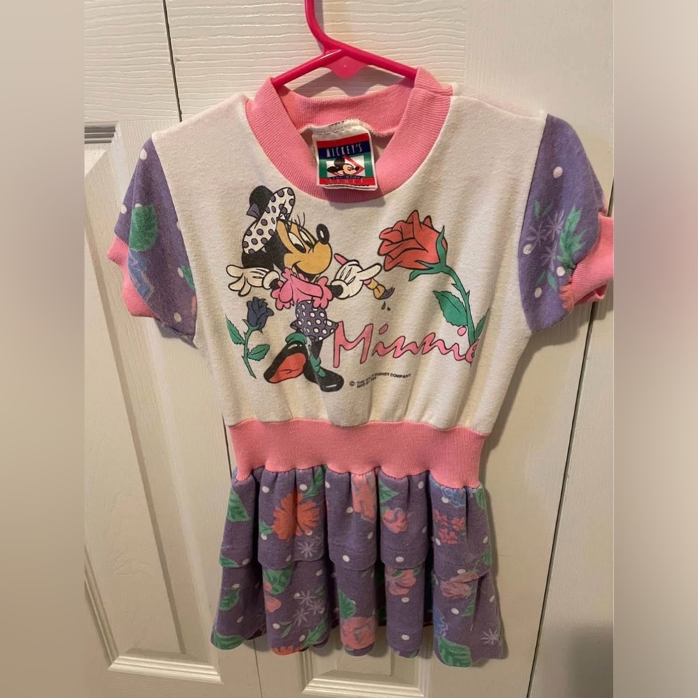 This 90s vintage Minnie Mouse dress with a white top and a purple floral skirt.